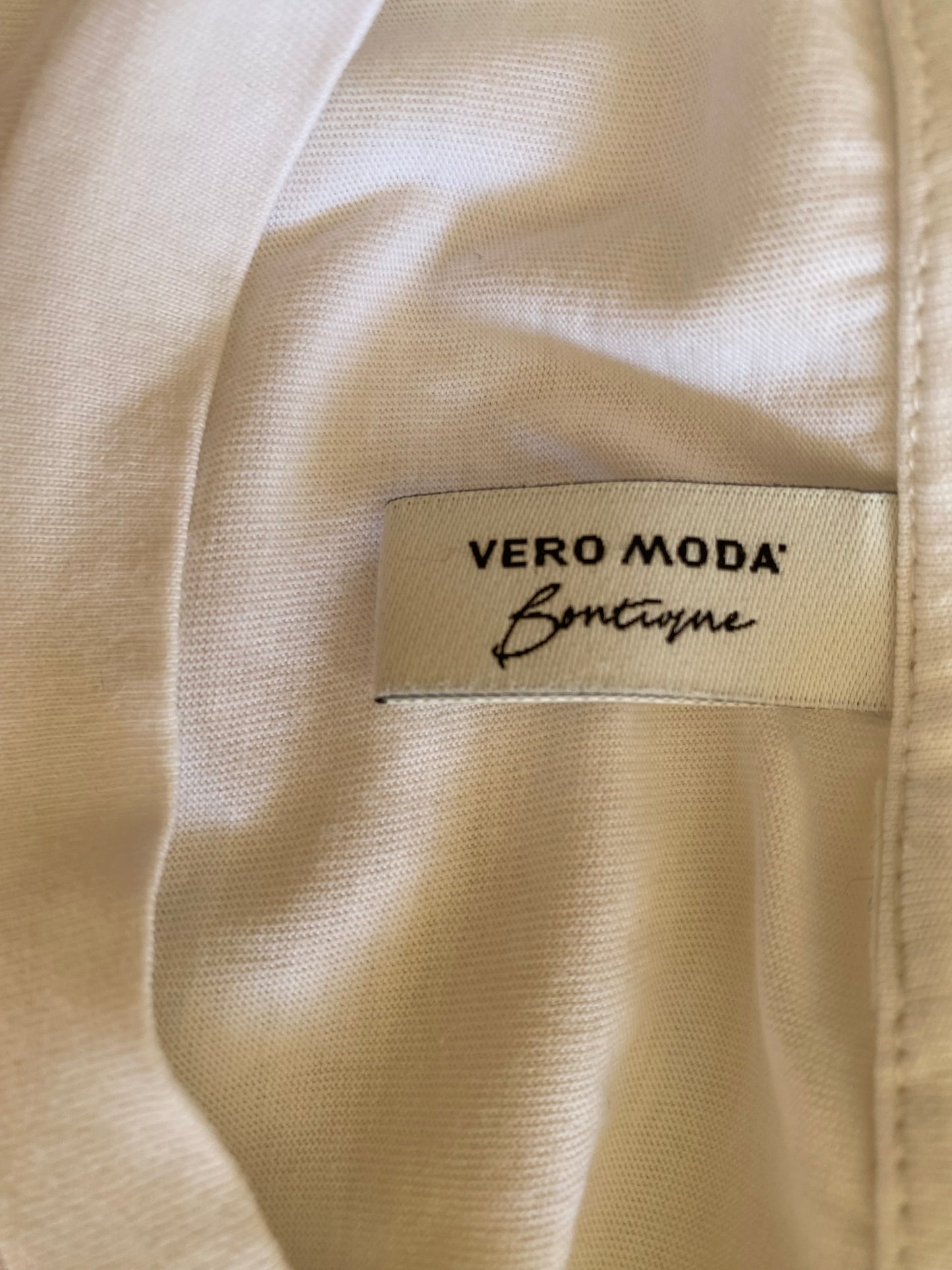 T-shirt en coton organique blanc avec un cœur doré scintillant